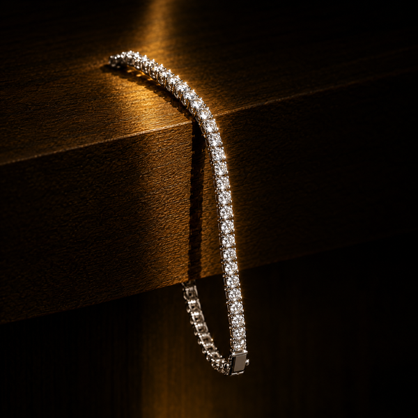 Iced out tennis bracelet draped over a wooden shelf in warm light