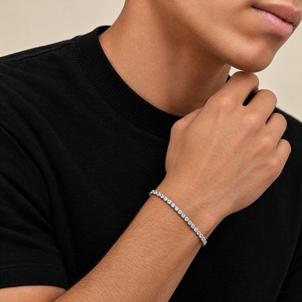 Man in a black t-shirt wearing the 3mm VVS tennis bracelet